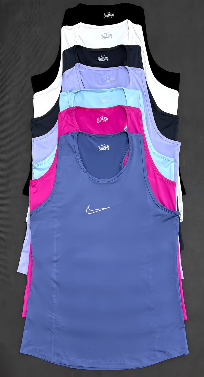 photo_2025-08-22_23-14-06 تاپ زنانه سايز بزرگ پشت قهرماني برش دار - تصویر 1